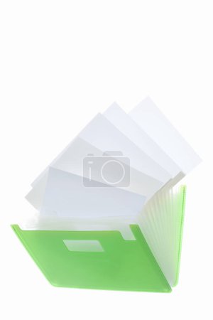 Photo for Green plastic folder with papers on white background - Royalty Free Image