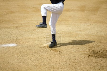 Téléchargez les photos : Un joueur de baseball pendant un match - en image libre de droit