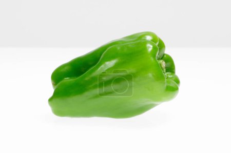 Photo for Fresh green bell pepper on white background - Royalty Free Image
