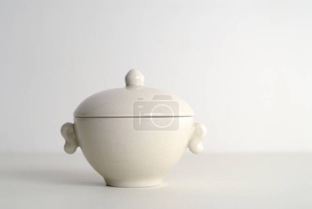 Photo for A white ceramic container on background, close up - Royalty Free Image