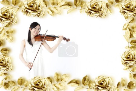 Photo for Floral frame with woman playing violin in white dress - Royalty Free Image