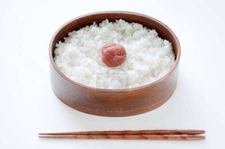 Photo for Japanese cuisine, rice with plum on background, close up - Royalty Free Image