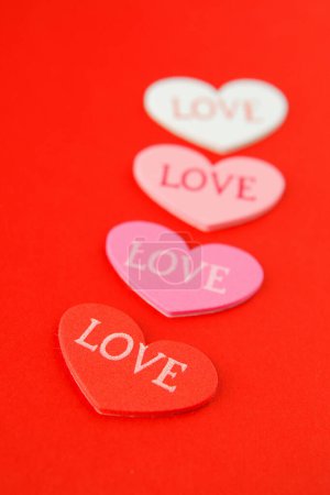 Téléchargez les photos : Fond de Saint Valentin romantique avec des cœurs et du texte - en image libre de droit