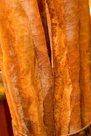 Photo for Freshly baked baguettes  in the bakery, close up - Royalty Free Image