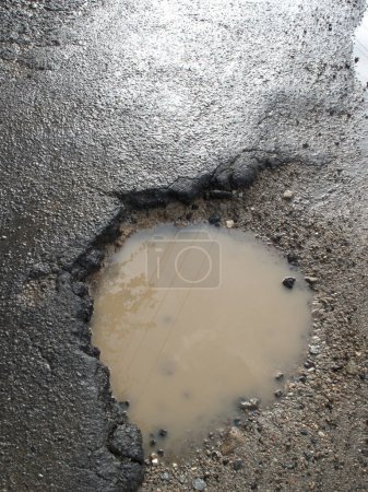 Photo for Dirty road surface with rain drops - Royalty Free Image