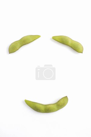 Photo for Close-up view of fresh organic green beans on white background - Royalty Free Image