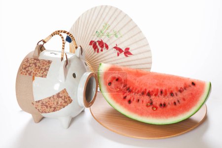 Eine Wassermelone und die Sommerrequisiten