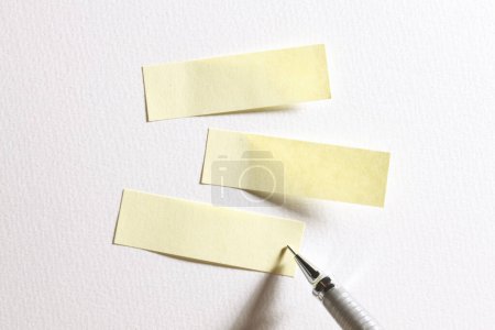 Photo for Blank sticky notes with  pen on grey background - Royalty Free Image
