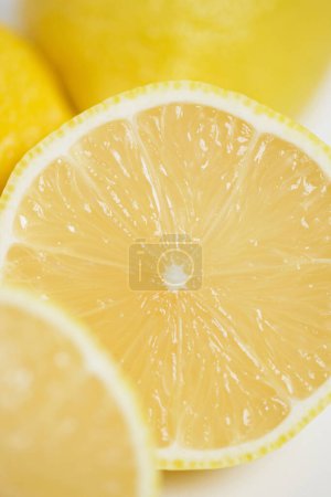 Photo for Fresh yellow lemons on background, close up - Royalty Free Image