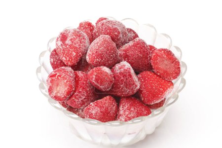 Photo for Frozen strawberries  in a glass bowl on background, close up - Royalty Free Image