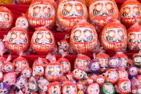 Photo for Daruma good luck dolls in Japan (foreigner words mean good luck) - Royalty Free Image