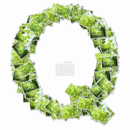 Photo for Symbol Q made of playing cards with green trees - Royalty Free Image