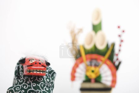 Téléchargez les photos : Tête de poupée lion rouge japonais - en image libre de droit