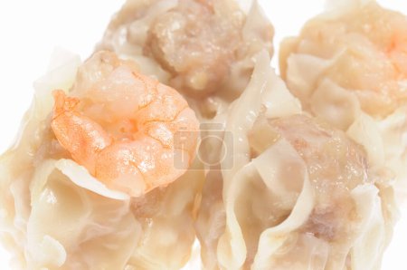 Foto de Sabrosos dumplings fritos gyoza en el fondo - Imagen libre de derechos