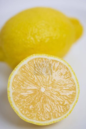 Photo for Fresh yellow lemons on background, close up - Royalty Free Image