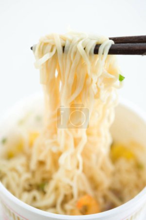 Photo for Noodle in a bowl with chopstick isolated on background - Royalty Free Image