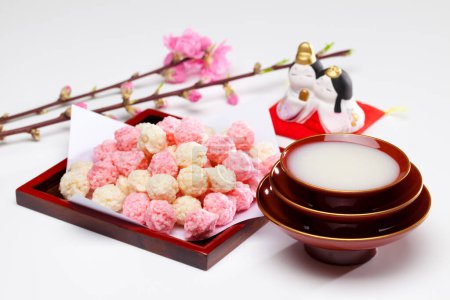 Japanese culture. Hina-arare, and hishimochi and konpeito.Hishimochi is a three-colored diamond-shaped rice cakes.On March 3rd, Japan celebrates Hina-matsuri, a festival celebrating girls.