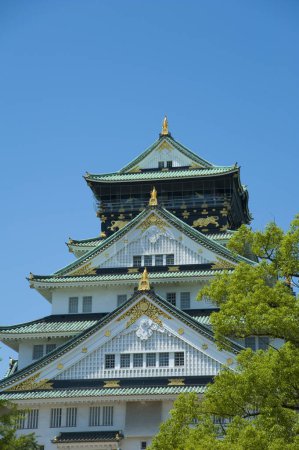 Main tower of Osaka castle under the blue sky, Osaka city, Japan
