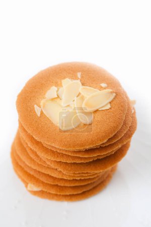 Photo for Close-up view of delicious cookies with almonds on white background - Royalty Free Image