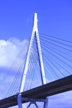 Photo for Tower, cables and deck of Tempozan Bridge. It is a cable-stayed bridge with harp design in Osaka, Japan. - Royalty Free Image