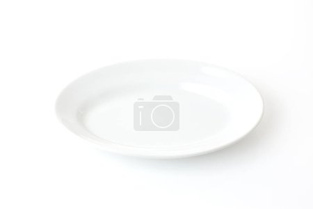 Photo for Empty white plate isolated on white background - Royalty Free Image