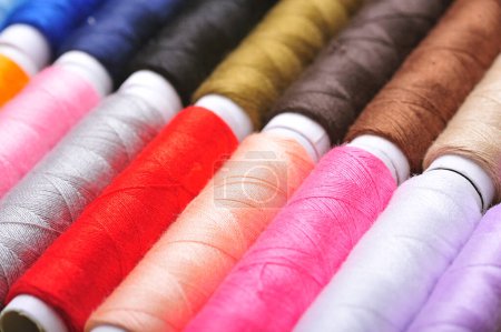 Photo for Colorful sewing threads  on  background, close up - Royalty Free Image