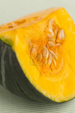 Photo for Fresh pumpkin  with seeds  on table background - Royalty Free Image