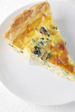 Photo for Delicious spinach tart with cheese, top view - Royalty Free Image