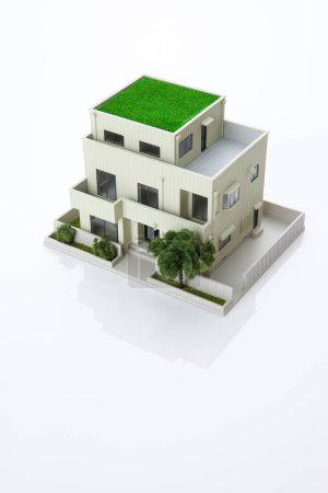 Photo for Small model of house on white background, mortgage concept - Royalty Free Image