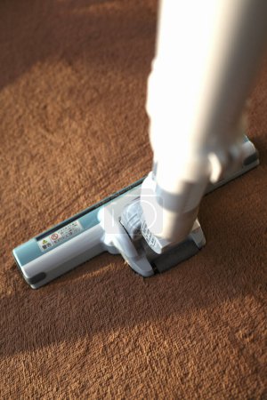 Photo for Vacuum cleaner on a carpet, close - up - Royalty Free Image