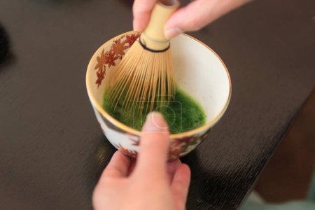Photo for Woman making tea, Outdoor Tea Ceremony concept - Royalty Free Image