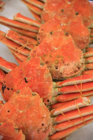 Photo for A bunch of crab legs on a table - Royalty Free Image