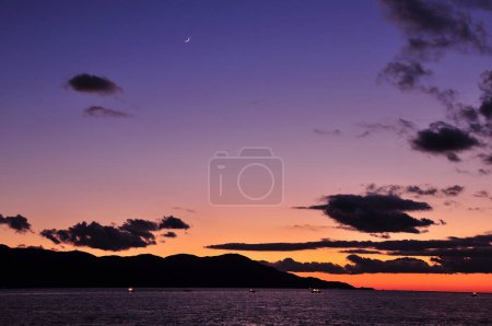 Photo for Beautiful sunset over the sea coast with scenic hills - Royalty Free Image