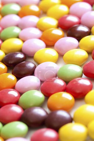 Photo for Close-up view of delicious sweet colorful candies on white background - Royalty Free Image