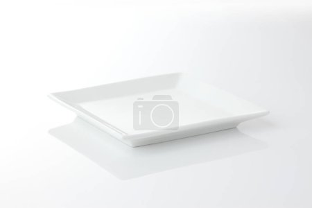 Photo for Empty white dish tray on a white background - Royalty Free Image