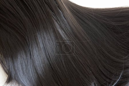 Photo for Brunette or black hair. Female long dark hair in black. Beautifully laid curls - Royalty Free Image