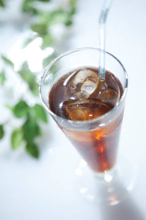 Photo for Fresh iced tea with straw isolated on white - Royalty Free Image