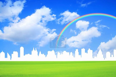 Téléchargez les photos : Illustration de la silhouette de la ville et arc-en-ciel contre ciel bleu - en image libre de droit