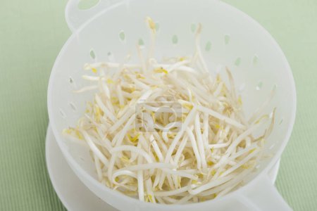 Photo for Tasty  sprouts, soybean sprouts on  background - Royalty Free Image