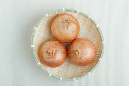 Photo for Onions in bowl, top view - Royalty Free Image
