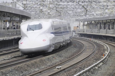 Photo for Modern, fast shinkansen Bullet Train speeding in  Japan. - Royalty Free Image