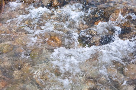 Photo for Water flowing on rocks, beautiful rapid mountain river - Royalty Free Image