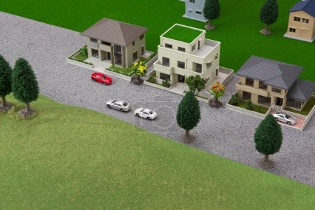 Téléchargez les photos : Model of the city of small houses and cars - en image libre de droit