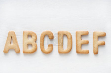 Photo for Letters of the alphabet cookies on white background - Royalty Free Image