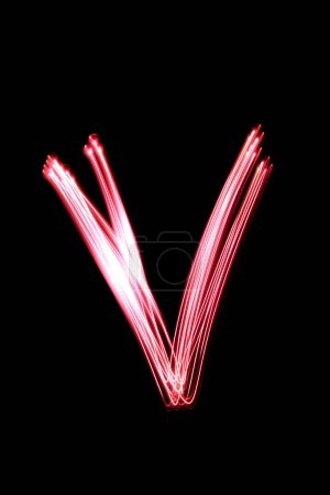 Photo for Light painting letter V on the dark background - Royalty Free Image