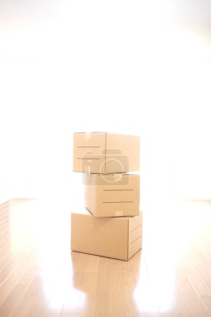 Photo for Cardboard boxes on white wall background. - Royalty Free Image