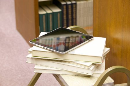 Photo for Close-up view of tablet computer in the library - Royalty Free Image