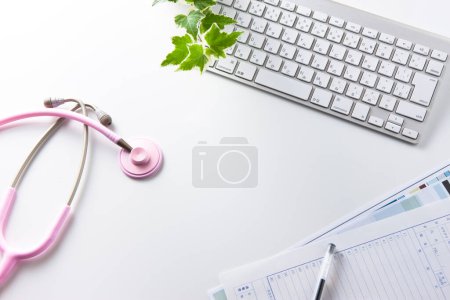 Photo for Keyboard And Pink Stethoscope - Royalty Free Image