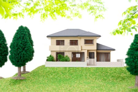 Foto de Modelo de casa moderna con pradera verde cubierta de hierba - Imagen libre de derechos
