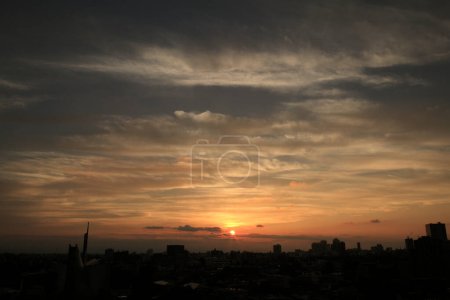 Photo for Beautiful bright sunset sky and urban city skyline - Royalty Free Image
